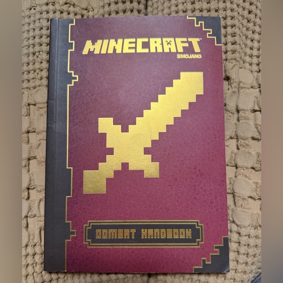 Other - Minecraft Combat Handbook - Gold Sword on Burgundy Cover